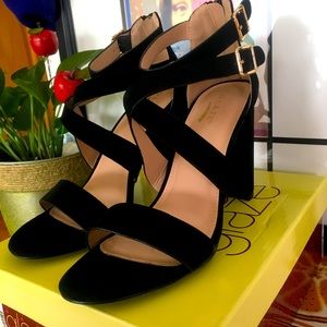 Black suede Lily-29. HEEL is 4 inches. Zip in the back. Made in China